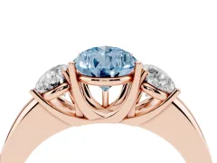 Fancy Blue Pear Cut Diamond Three-Stone Ring Set in Rose gold with Bold Center and Classic Band