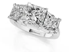Princess Cut Diamond Three-Stone Ring Set in Platinum with Channel-Set Band and Prong Settings