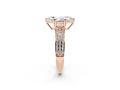 Marquise Cut Diamond Solitaire Ring Set in Rose gold with Multi-Row Round Pavé Band and Prong Setting
