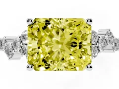 Fancy Yellow Radiant Cut Diamond Ring Set in Platinum with Scattered Round Accents