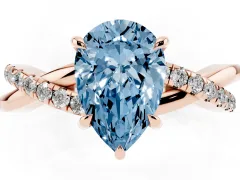 Fancy Blue Pear Cut Diamond Twisted Pavé Band Ring Set in Rose gold with Prong Setting