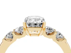 Emerald Cut Diamond Five-Stone Prong Set Engagement Ring Set in Yellow gold with Channel Band