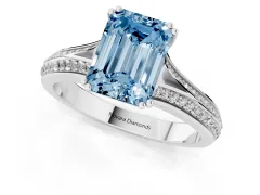 Fancy Blue Emerald Cut Diamond Split Shank Pavé Engagement Ring Set in Platinum with Prong-Set Center Stone