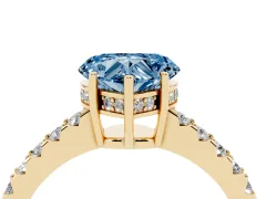 Fancy Blue Heart Cut Diamond Solitaire Engagement Ring Set in Yellow gold with Pavé Band and Prong Setting