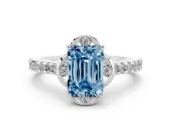 Fancy Blue Emerald Cut Diamond Solitaire Ring Set in Silver with Pavé Band and Floral Prong Setting