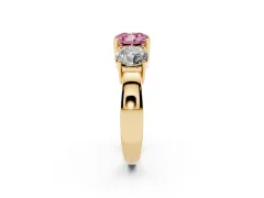 Fancy Pink Cushion Cut Diamond Three-Stone Ring Set in Yellow gold with Round Side Stones and Classic Band