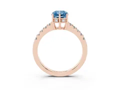 Fancy Blue Radiant Cut Diamond Solitaire Engagement Ring Set in Rose gold with Pavé Band and Prong Setting
