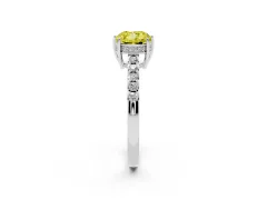 Fancy Yellow Cushion Cut Diamond Solitaire Engagement Ring Set in Platinum with Pavé Band and Prong Setting