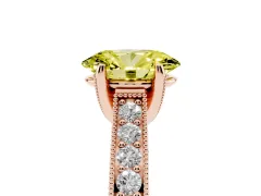 Fancy Yellow Oval Cut Diamond Solitaire Ring Set in Rose gold with Milgrain-Edged Pavé Band and Prong Setting