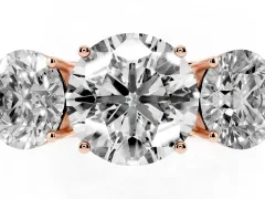 Round Cut Diamond Three-Stone Ring Set in Rose gold with Textured Band