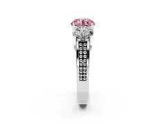 Fancy Pink Round Cut Diamond Three-Stone Ring Set in Platinum with Textured Band