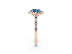 Fancy Blue Heart Cut Diamond Pavé Halo Engagement Ring Set in Rose gold with Pavé Band and Prong Setting