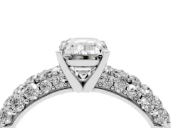 Emerald Cut Diamond Pavé Band Solitaire Ring Set in Platinum with Close-Set Accent Stones and Prong Setting