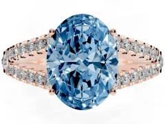 Fancy Blue Oval Cut Diamond Split Shank Pavé Engagement Ring Set in Rose gold with Prong-Held Center Stone