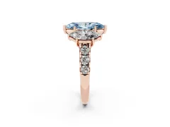 Fancy Blue Marquise Cut Diamond Three-Stone Ring Set in Rose gold with Pavé Band