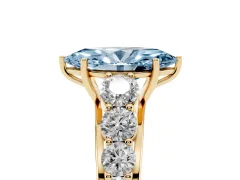 Fancy Blue Marquise Cut Diamond Solitaire Ring Set in Yellow gold with Pavé-Set Band and Prong Setting