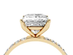 Princess Cut Diamond Solitaire Engagement Ring Set in Yellow gold with Round Pavé Band and Prong Setting