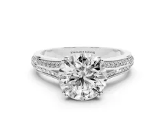 Round Cut Diamond Split Shank Pavé Engagement Ring Set in White gold with Prong-Set Center Stone
