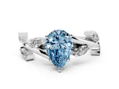 Fancy Blue Pear Cut Diamond Solitaire Ring Set in White gold with Twisted Marquise Accent Band