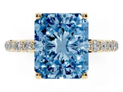 Fancy Blue Radiant Cut Diamond Solitaire Engagement Ring Set in Yellow gold with Round Pavé Band and Prong Setting