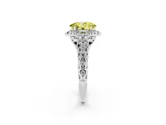 Fancy Yellow Oval Cut Diamond Solitaire Ring Set in White gold with Hidden Halo and Pavé Band