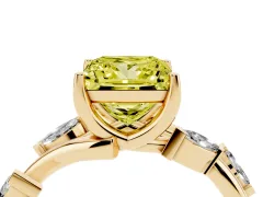 Fancy Yellow Princess Cut Diamond Solitaire Ring Set in Yellow gold with Twisted Marquise Accent Band