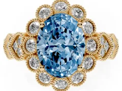Fancy Blue Oval Cut Diamond Solitaire Ring Set in Yellow gold with Milgrain Pavé Heart Band