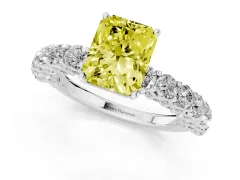 Fancy Yellow Radiant Cut Diamond Solitaire Ring Set in White gold with Shared Prong Pavé Band