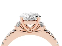 Oval Cut Diamond Three-Stone Pavé Ring Set in Rose gold with Prong Setting