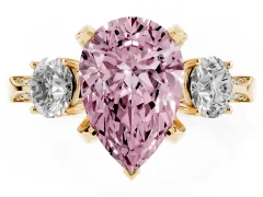 Fancy Pink Pear Cut Diamond Three-Stone Ring Set in Yellow gold with Pavé Band and Smaller Side Stones
