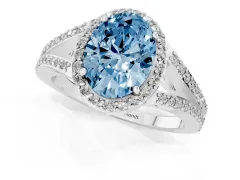 Fancy Blue Oval Cut Diamond Halo Split Shank Pavé Ring Set in Platinum with Prong Setting