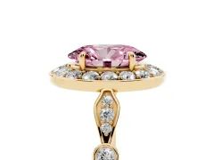 Fancy Pink Oval Cut Diamond Halo Engagement Ring Set in Yellow gold with Twisted Band and Prong Setting