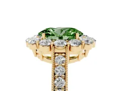 Fancy Green Oval Cut Diamond Halo Pavé Engagement Ring Set in Yellow gold with Milgrain Detailing