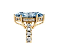 Fancy Blue Marquise Cut Diamond Solitaire Engagement Ring Set in Yellow gold with Pavé Band and Prong Setting