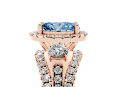 Fancy Blue Oval Cut Diamond Halo Split Shank Ring Set in Rose gold with Round Accent Stones and Prong Setting