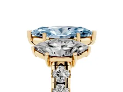 Fancy Blue Marquise Cut Diamond Three-Stone Ring Set in Yellow gold with Pavé Band