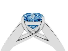 Fancy Blue Cushion Cut Diamond Solitaire Ring Set in Silver with Channel-Set Accent Stones and Prong Setting