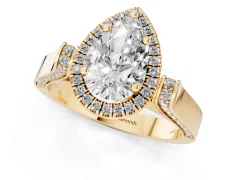 Pear Cut Diamond Halo Ring Set in Yellow gold with Pavé-Lined Split Shank Band