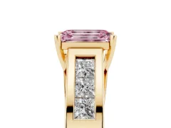 Fancy Pink Emerald Cut Diamond Solitaire Ring Set in Yellow gold with Channel-Set Accent Stones and Prong Setting