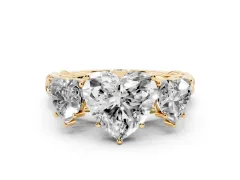 Heart Cut Diamond Three-Stone Ring Set in Yellow gold with Braided Band