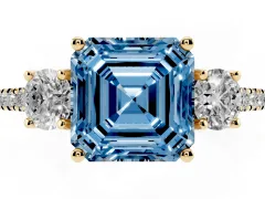 Fancy Blue Asscher Cut Diamond Three-Stone Ring Set in Yellow gold with Pavé Band and Graduated Sides