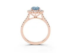 Fancy Blue Oval Cut Diamond Halo Ring Set in Rose gold with Pavé Band and Prong Setting