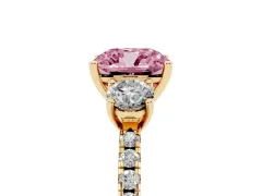 Fancy Pink Cushion Cut Diamond Three-Stone Ring Set in Yellow gold with Pavé Band and Graduated Sides