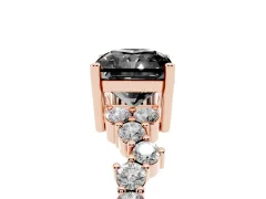 Fancy Black Radiant Cut Diamond Ring Set in Rose gold with Scattered Round Accents