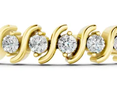 Round Brilliant Diamond Channel Tennis Bracelet Set in Yellow gold with S-Shaped Prongs