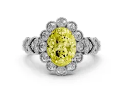 Fancy Yellow Oval Cut Diamond Solitaire Ring Set in Silver with Milgrain Pavé Heart Band