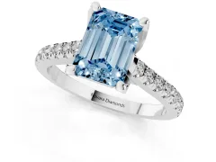 Fancy Blue Emerald Cut Diamond Solitaire Ring Set in White gold with Brilliant Pavé Band and Prong Setting