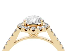 Pear Cut Diamond Pavé Halo Engagement Ring Set in Yellow gold with Pavé Band and Prong Setting
