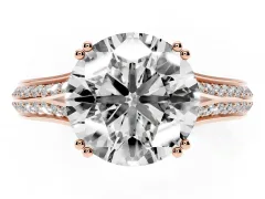 Round Cut Diamond Split Shank Pavé Engagement Ring Set in Rose gold with Prong-Set Center Stone