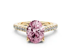 Fancy Pink Oval Cut Diamond Solitaire Ring Set in Yellow gold with Brilliant Pavé Band and Prong Setting